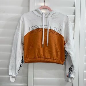 The Kooples two tone orange and ecru sweatshirt with logo. Retails 275$ xs